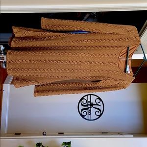 Super soft poly/cotton blend sweater dress.